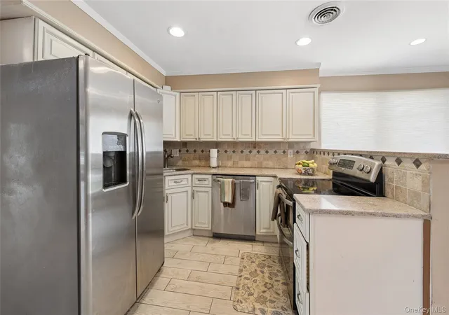 Photo 3 of Condo for sale at 100 Baker Ct #90, Hempstead, NY 11558 | MLS# 1028219 | Listing updated on 2026-08-16