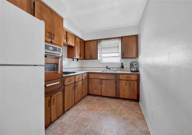 Photo 3 of Sale Pending at 14019 Sutter Ave, Jamaica, NY 11436 | MLS# 1028336 | Listing updated on 2026-08-26