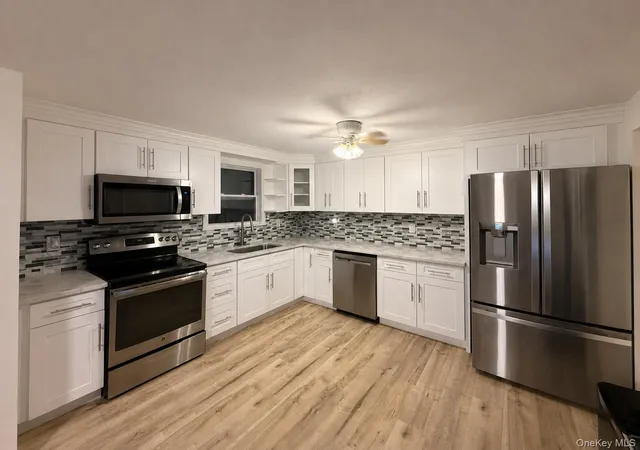 Photo 4 of Single family home for sale at 65 Biscayne Dr, Brookhaven, NY 11784 | MLS# 1028828 | Listing updated on 2026-10-02