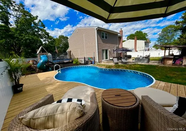 Photo 2 of Sale Pending at 32 Morris Ave, Brookhaven, NY 11772 | MLS# 1028853 | Listing updated on 2026-08-11