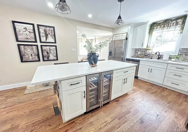 Photo 3 of Sale Pending at 32 Morris Ave, Brookhaven, NY 11772 | MLS# 1028853 | Listing updated on 2026-08-11