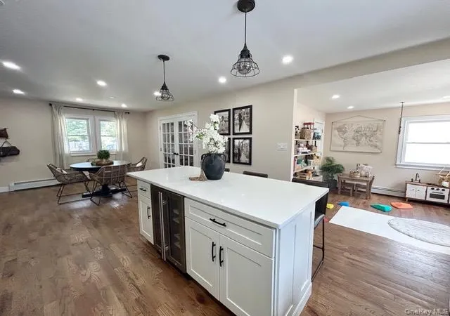 Photo 3 of Sale Pending at 32 Morris Ave, Brookhaven, NY 11772 | MLS# 1028853 | Listing updated on 2026-08-11