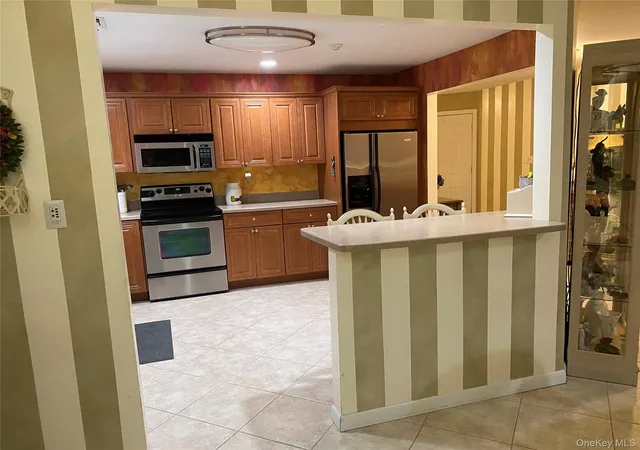 Photo 4 of Condo for sale at 132 Captains Ct, Brookhaven, NY 11955 | MLS# 1028949 | Listing updated on 2026-08-31