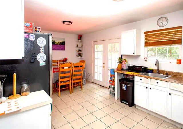 Photo 3 of Sale Pending at 32 Birch Ct, Riverhead, NY 11901 | MLS# 1029093 | Listing updated on 2026-08-27