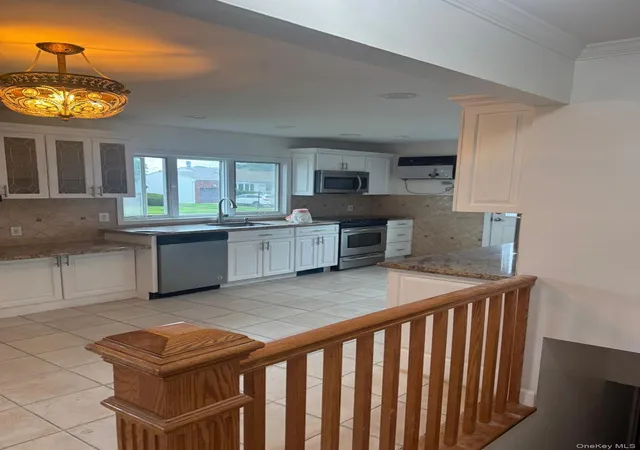 Photo 2 of Single family home for sale at 14 Larch St, Oyster Bay, NY 11801 | MLS# 1029511 | Listing updated on 2026-09-06