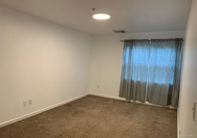Listing Photo 5 - Condo for sale in building located at 301 Willow Ln, Hempstead, NY 11580