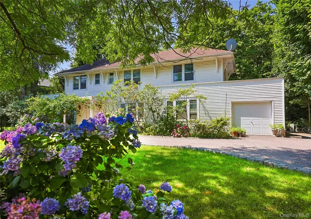 Photo 2 of Single family home for sale at 14 Clover Dr, North Hempstead, NY 11021 | MLS# 1030494 | Listing updated on 2026-07-27