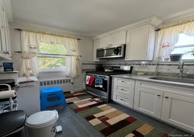 2nd image of 131 03 233 Rd Rd #upper, New York, NY 11422 | MLS# 1030518