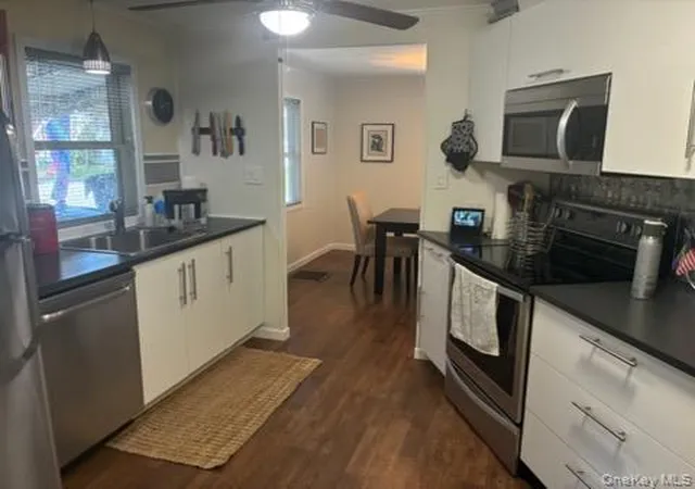 Photo 3 of Sale Pending at 1661 Old Country Rd #17, Riverhead, NY 11901 | MLS# 1030728 | Listing updated on 2026-10-03