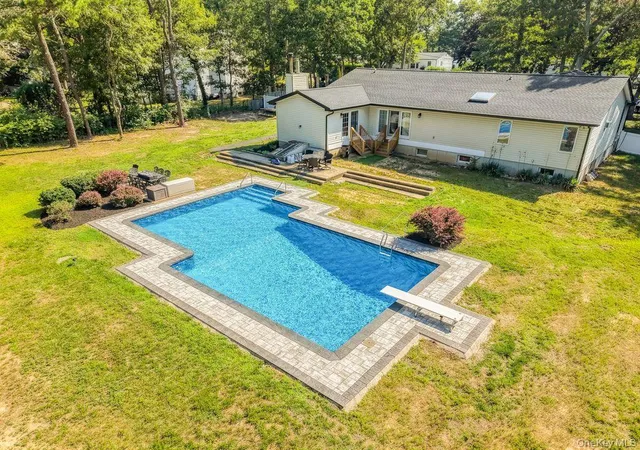 Photo 3 of Single family home for sale at 24 Bauer Ave, Brookhaven, NY 11949 | MLS# 1030838 | Listing updated on 2026-10-05