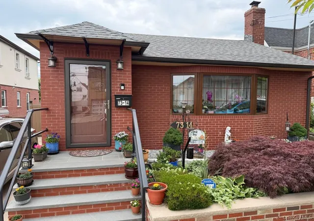 Single family home for sale at 7314 69th Avenue, New York, NY 11379 | MLS# 1030884