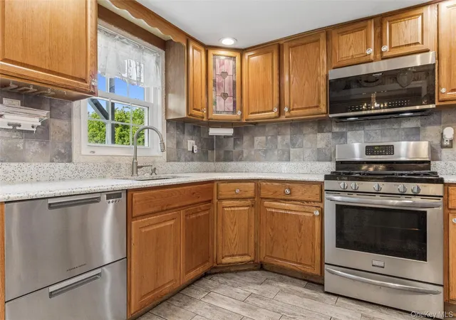 Photo 3 of Sale Pending at 84 Barnum St, West Babylon, NY 11704 | MLS# 1030918 | Listing updated on 2026-08-11