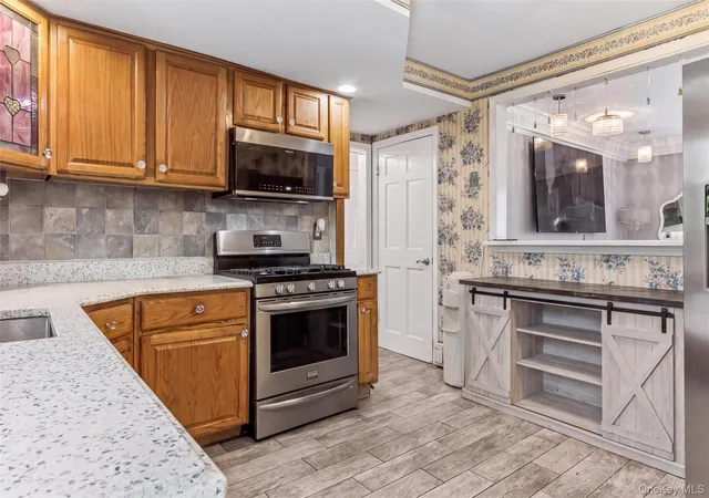 Photo 3 of Sale Pending at 84 Barnum St, West Babylon, NY 11704 | MLS# 1030918 | Listing updated on 2026-08-11