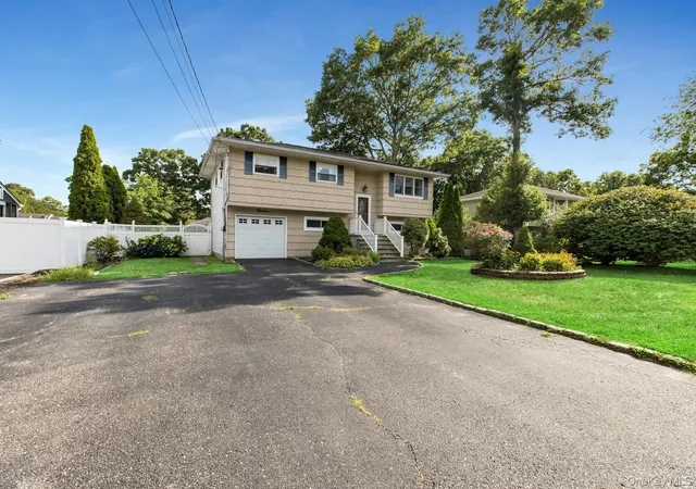 Photo 2 of Sale Pending at 14 Floradora Dr, Brookhaven, NY 11950 | MLS# 1031025 | Listing updated on 2026-08-12