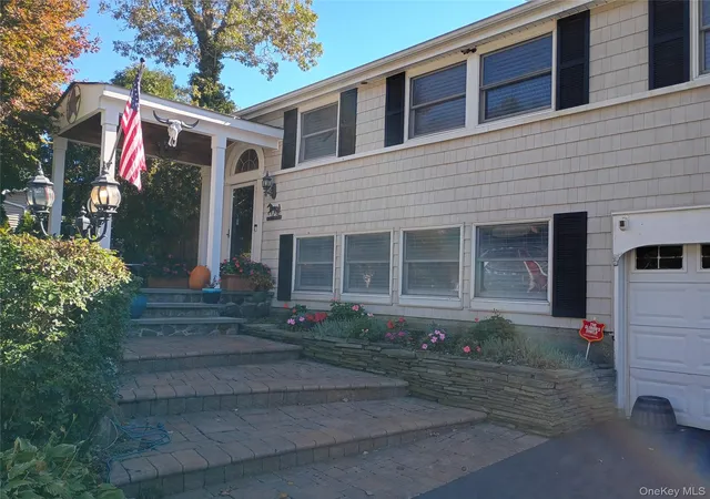 Photo 1 of Single family home for sale at 14 Fairway Dr, Brookhaven, NY 11776 | MLS# 1031586 | Listing updated on 2026-10-26