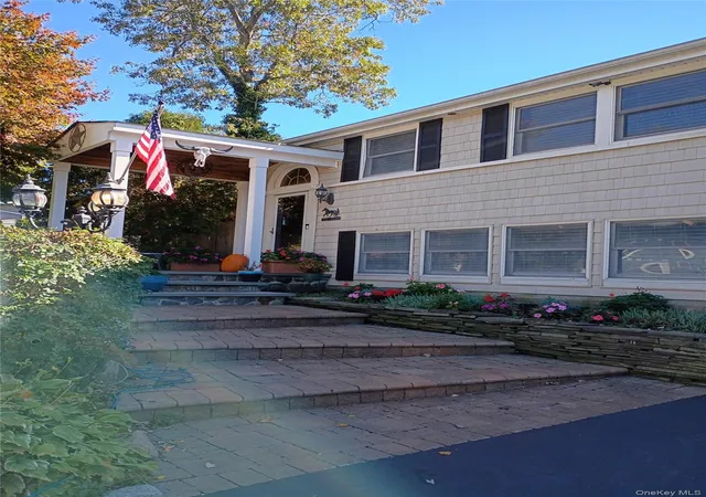 Photo 2 of Single family home for sale at 14 Fairway Dr, Brookhaven, NY 11776 | MLS# 1031586 | Listing updated on 2026-10-26
