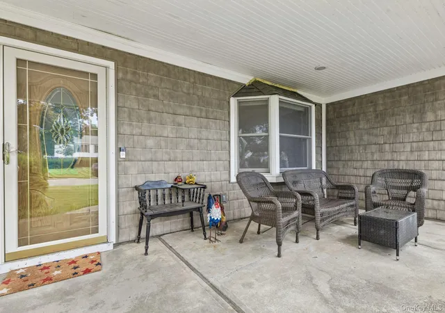 Photo 2 of Single family home for sale at 21 Manchester Ln, Brookhaven, NY 11790 | MLS# 1031657 | Listing updated on 2026-09-06