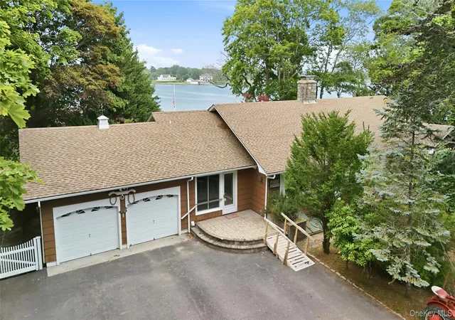 Photo 3 of Sale Pending at 31 Tuthill Point Rd, Brookhaven, NY 11940 | MLS# 1031681 | Listing updated on 2026-08-26