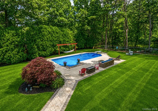 Photo 3 of Single family home for sale at 411 Robinson Ave, Brookhaven, NY 11772 | MLS# 1032055 | Listing updated on 2026-08-02