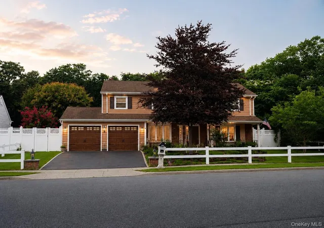 Photo 1 of Single family home for sale at 8 Singingwood Dr, Brookhaven, NY 11741 | MLS# 1032301 | Listing updated on 2026-09-05