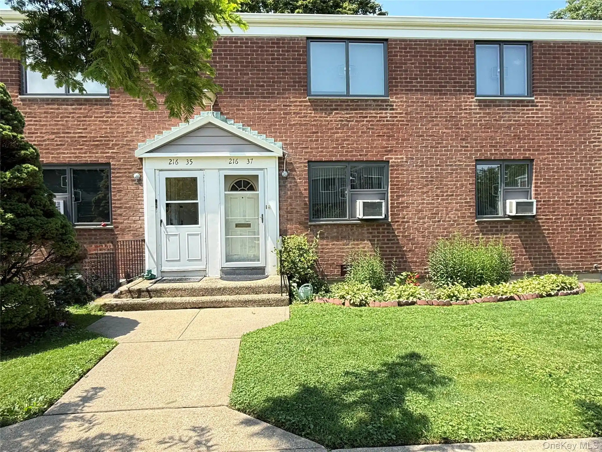 Listing Photo 1 - Condo for sale in 216-37 68Th Ave located at 216-37 68Th Ave, New York, NY 11364 - Unit 216-37 68th Avenue