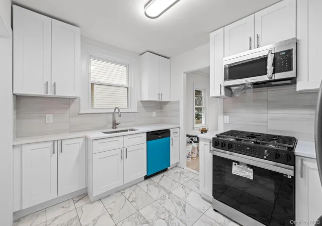 Photo 3 of Single family home for sale at 2 Fordham Pl, Hempstead, NY 11550 | MLS# 1032465 | Listing updated on 2026-09-06