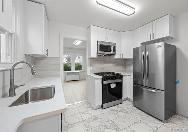 Photo 4 of Single family home for sale at 2 Fordham Pl, Hempstead, NY 11550 | MLS# 1032465 | Listing updated on 2026-09-06