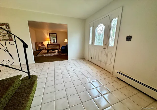 Photo 3 of Sale Pending at 15 Stonehurst Ln, Huntington, NY 11746 | MLS# 1032468 | Listing updated on 2026-08-19
