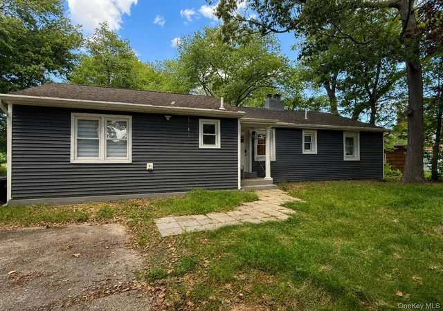 Photo 1 of Single family home for sale at 7 Lake Dr, Brookhaven, NY 11953 | MLS# 1032641 | Listing updated on 2026-07-31