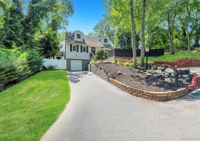 Photo 2 of Single family home for sale at 14 Seaside Ave, Brookhaven, NY 11789 | MLS# 1032717 | Listing updated on 2026-09-20