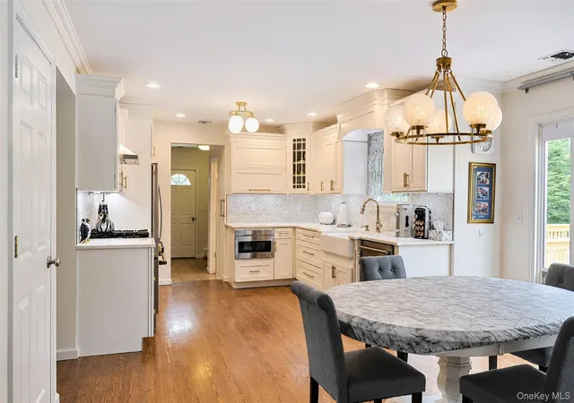 Photo 3 of Single family home for sale at 14 Southaven Dr, Brookhaven, NY 11719 | MLS# 1032898 | Listing updated on 2026-10-04