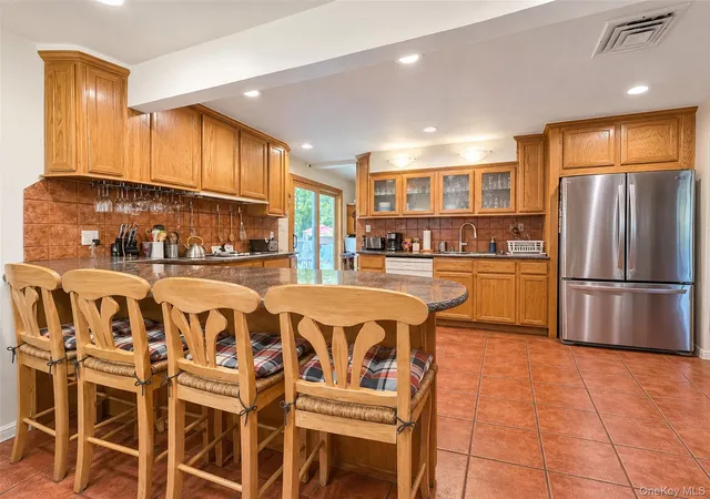 Photo 2 of Single family home for sale at 8 Virginia Dr, Brookhaven, NY 11763 | MLS# 1033489 | Listing updated on 2026-10-07