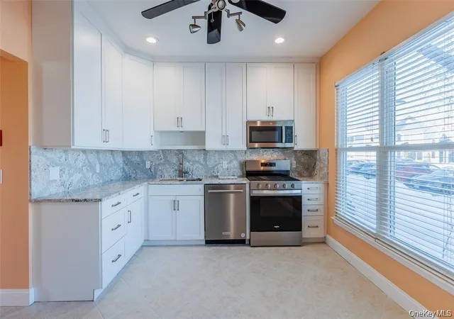 Photo 5 of Sale Pending at 728 Birchwood Park Dr, Brookhaven, NY 11953 | MLS# 1033609 | Listing updated on 2026-08-28