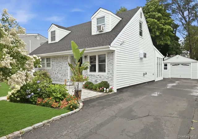Photo 3 of Sale Pending at 913 Merillon Ave, Hempstead, NY 11590 | MLS# 1033908 | Listing updated on 2026-08-21