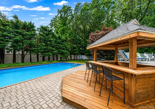 Photo 2 of Sale Pending at 8 Old Orchard Ct, Brookhaven, NY 11778 | MLS# 1034101 | Listing updated on 2026-09-12