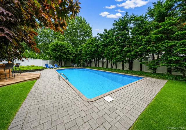 Photo 3 of Sale Pending at 8 Old Orchard Ct, Brookhaven, NY 11778 | MLS# 1034101 | Listing updated on 2026-09-12