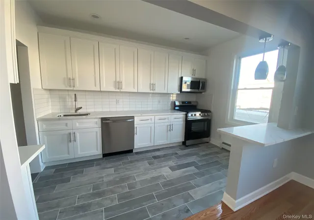 Photo 3 of House for sale at 71-27 69th Street, New York, NY 11385 | MLS# 1034215 | Listing updated on 2026-09-03