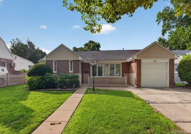 Photo 3 of Sale Pending at 375 Peninsula Blvd, Hempstead, NY 11563 | MLS# 1034365 | Listing updated on 2026-08-28