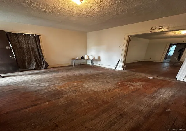 Photo 4 of Sale Pending at 11824 219th Street, New York, NY 11411 | MLS# 1034820 | Listing updated on 2026-09-04