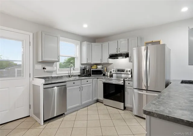 Photo 3 of Sale Pending at 24 Peters Dr, Brookhaven, NY 11967 | MLS# 1034887 | Listing updated on 2026-08-22