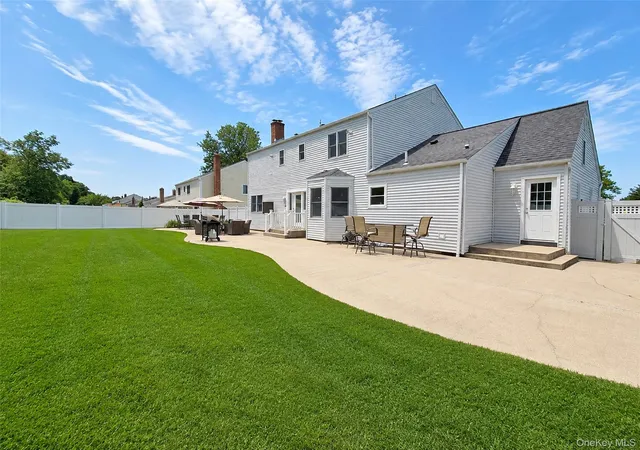 Photo 2 of Single family home for sale at 73 Springmeadow Dr, Islip, NY 11741 | MLS# 1034957 | Listing updated on 2026-08-30