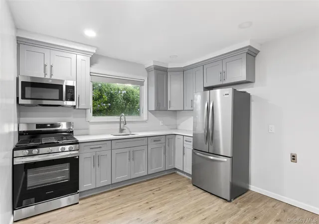 Photo 3 of Multi family home for sale at 336 Scranton Ave, Hempstead, NY 11563 | MLS# 1034969 | Listing updated on 2026-08-23