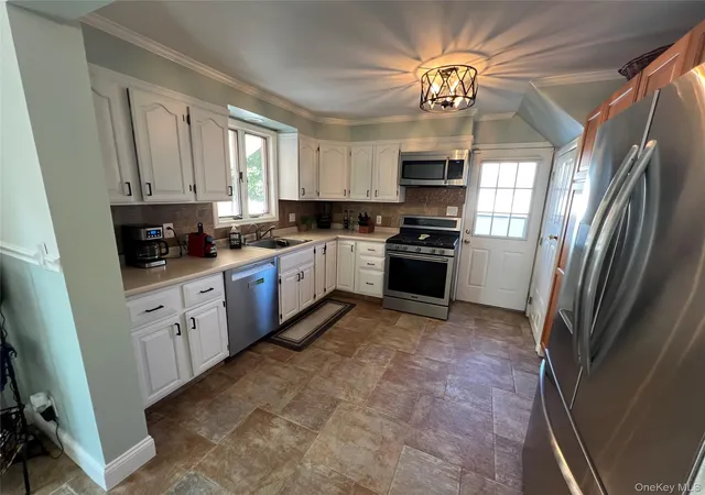 Photo 4 of Single family home for sale at 11 Bonaparte Pl, Hempstead, NY 11510 | MLS# 1035210 | Listing updated on 2026-09-01