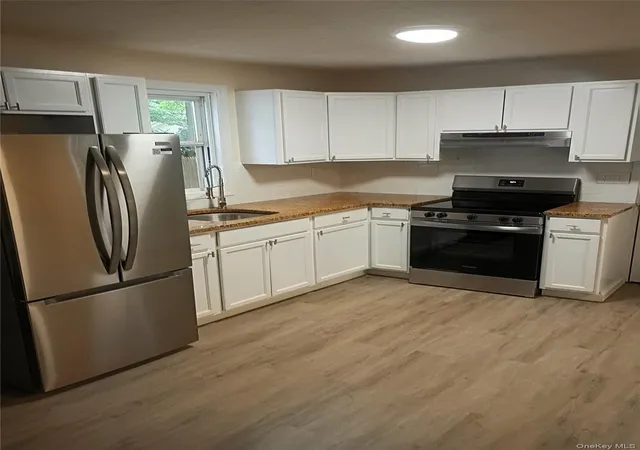 Photo 4 of Sale Pending at 16 Neighborhood Rd, Brookhaven, NY 11951 | MLS# 1035494 | Listing updated on 2026-09-29