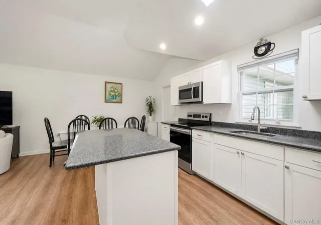 Photo 2 of Single family home for sale at 899 Hawkins Ave, Brookhaven, NY 11755 | MLS# 1035767 | Listing updated on 2026-10-03