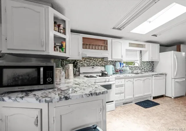 Photo 3 of Manufactured home for sale at 13 Mindy Ln, Islip, NY 11716 | MLS# 1036313 | Listing updated on 2026-09-02