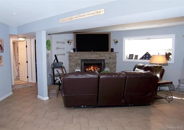 Photo 3 of Single family home for sale at 11 Doral Ln, Brookhaven, NY 11980 | MLS# 1036687 | Listing updated on 2026-08-23