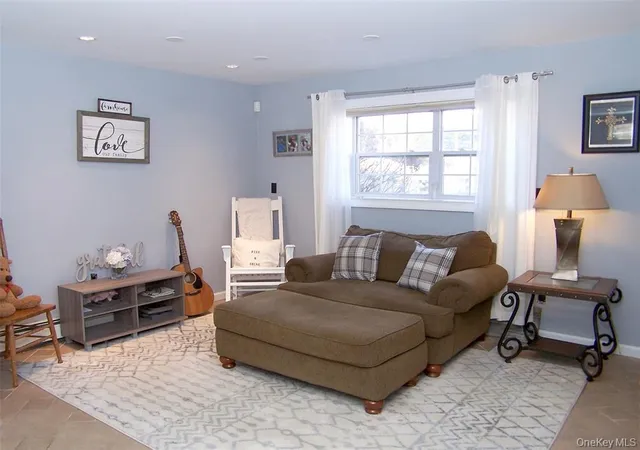 Photo 4 of Single family home for sale at 11 Doral Ln, Brookhaven, NY 11980 | MLS# 1036687 | Listing updated on 2026-08-23