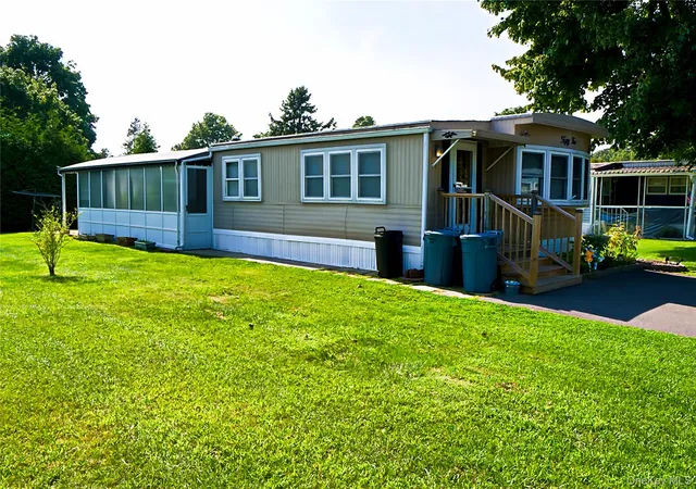 Photo 1 of Manufactured home for sale at 703 Fresh Pond Ave #55, Riverhead, NY 11933 | MLS# 1037046 | Listing updated on 2026-10-05