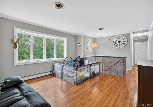 Photo 4 of Sale Pending at 100 Birchwood Dr, Woodbury, NY 10930 | MLS# 1037218 | Listing updated on 2026-09-17